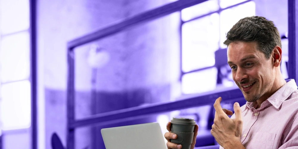 man-laptop-coffee-chat-1219591538_1920x1080