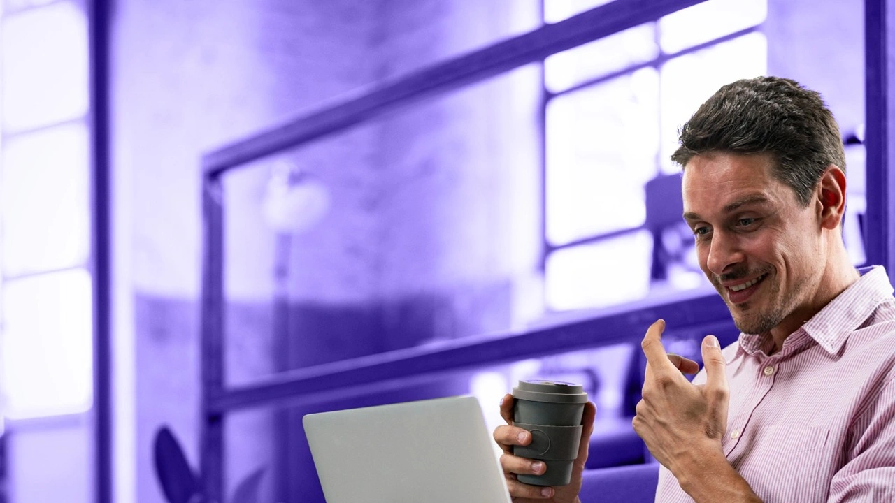 man-laptop-coffee-chat-1219591538_1920x1080